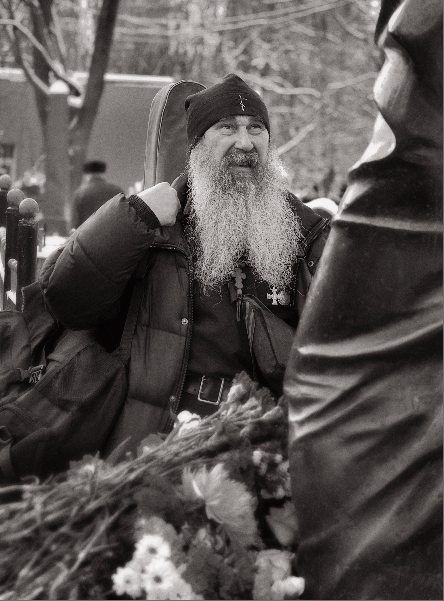 A priest with a guitar