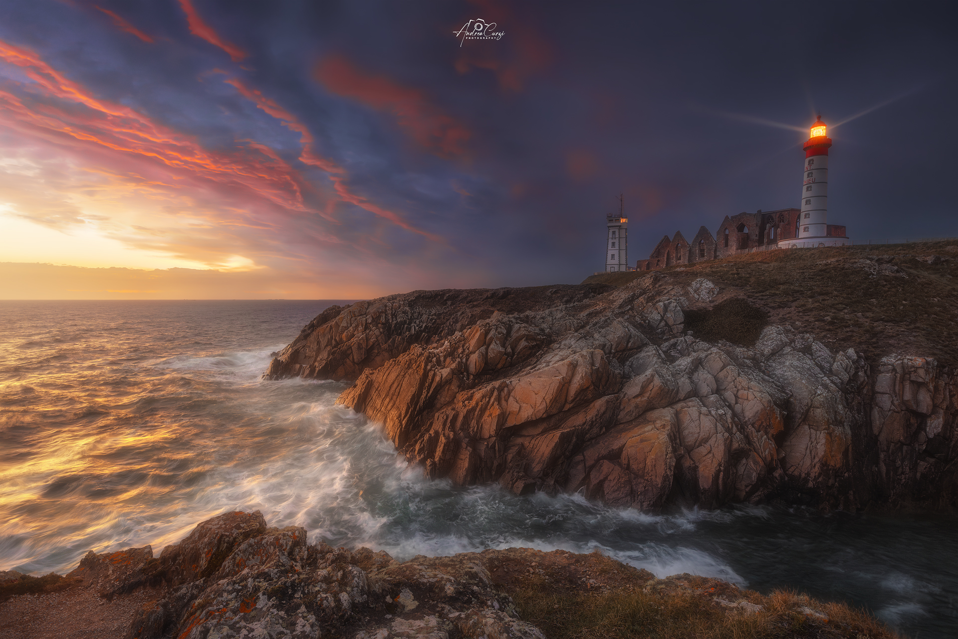 Sunset over the lighthouse of Pointe Saint Mathieu