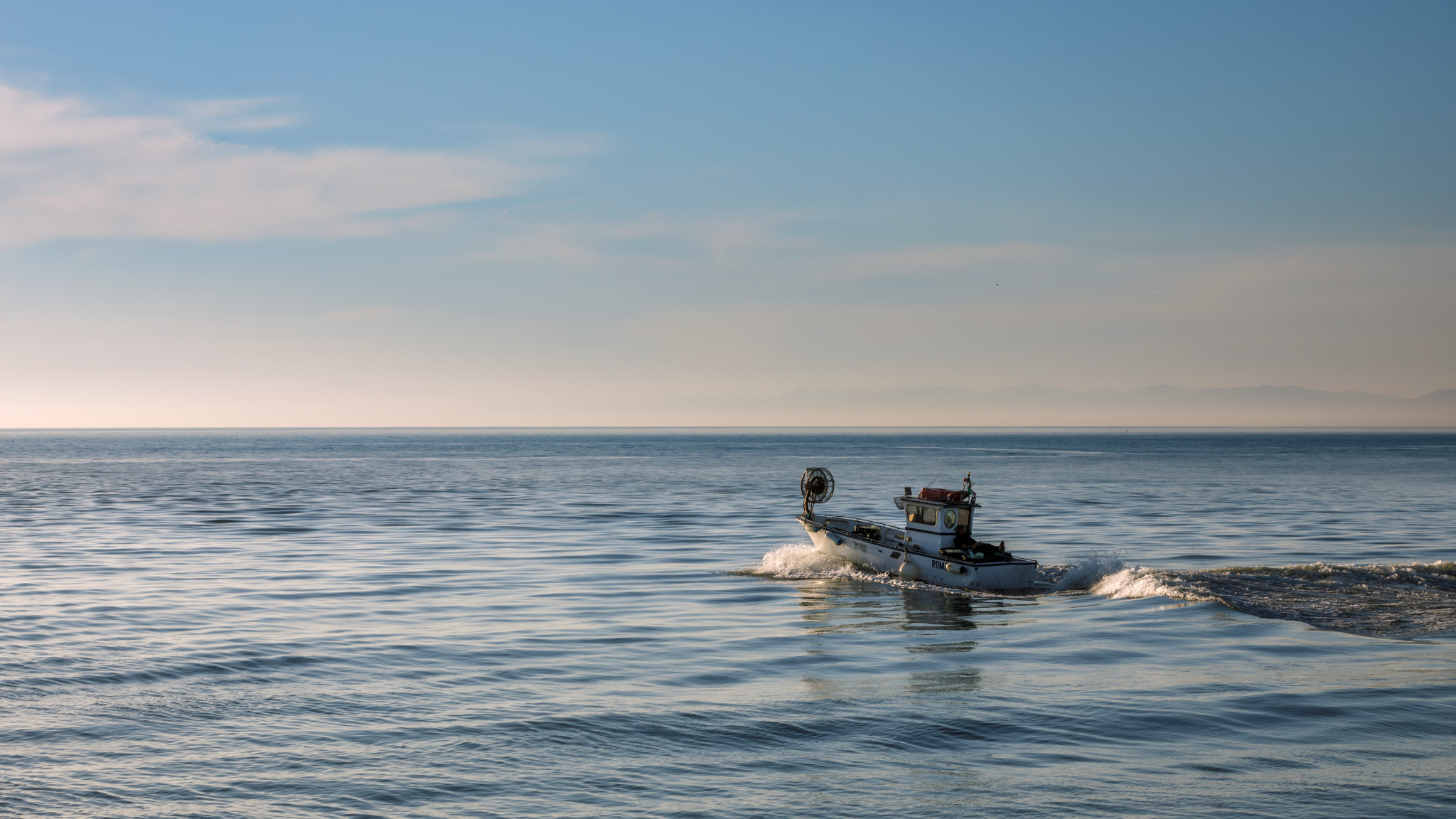 The fishing boat takes off
