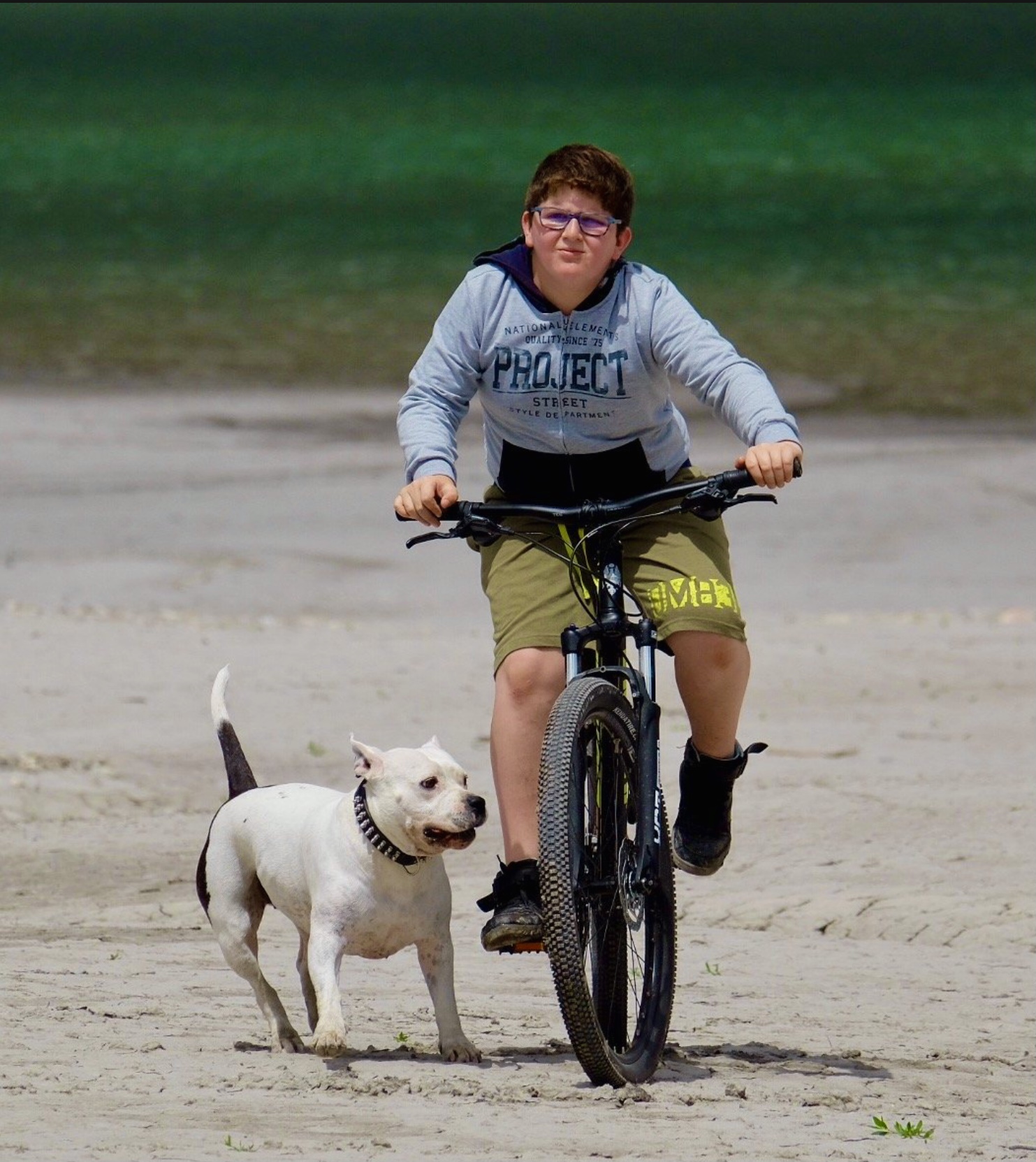 Son on a bicycle