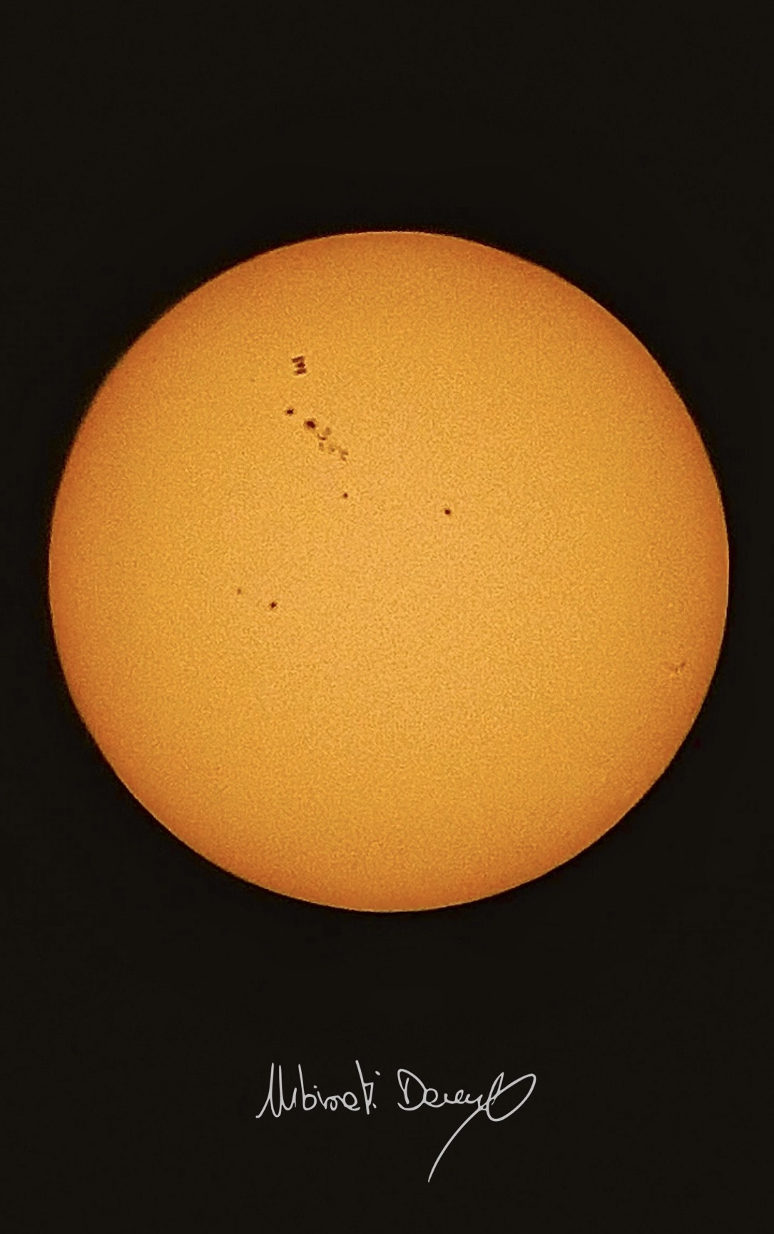 Iss sul disco solare e macchie