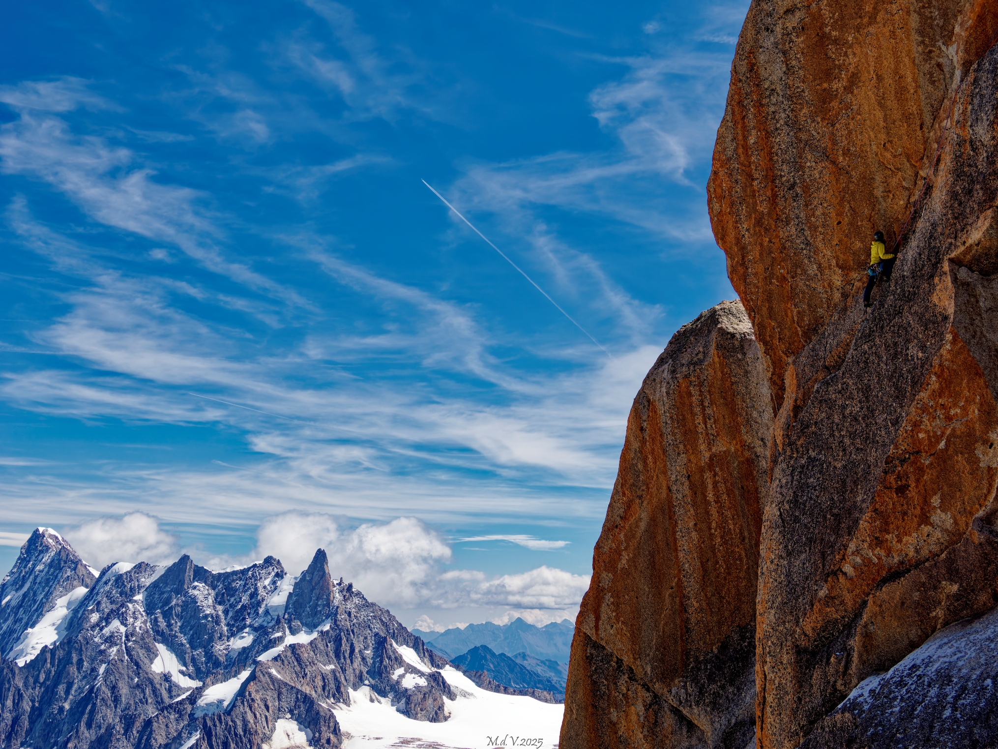 Rock climber on the Aiguille Du Midi