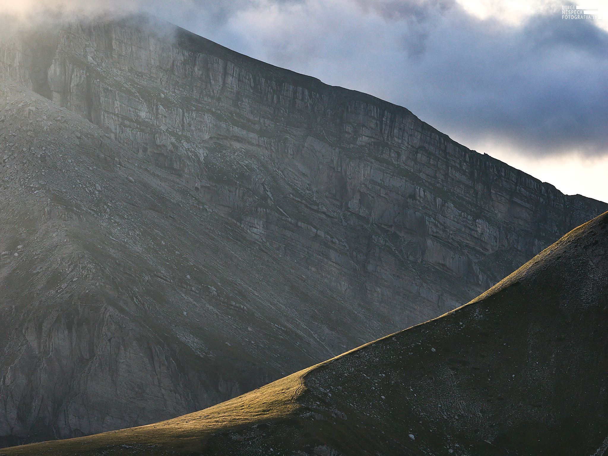 Blades of light on the ridge with OM 50-200mm telephoto lens