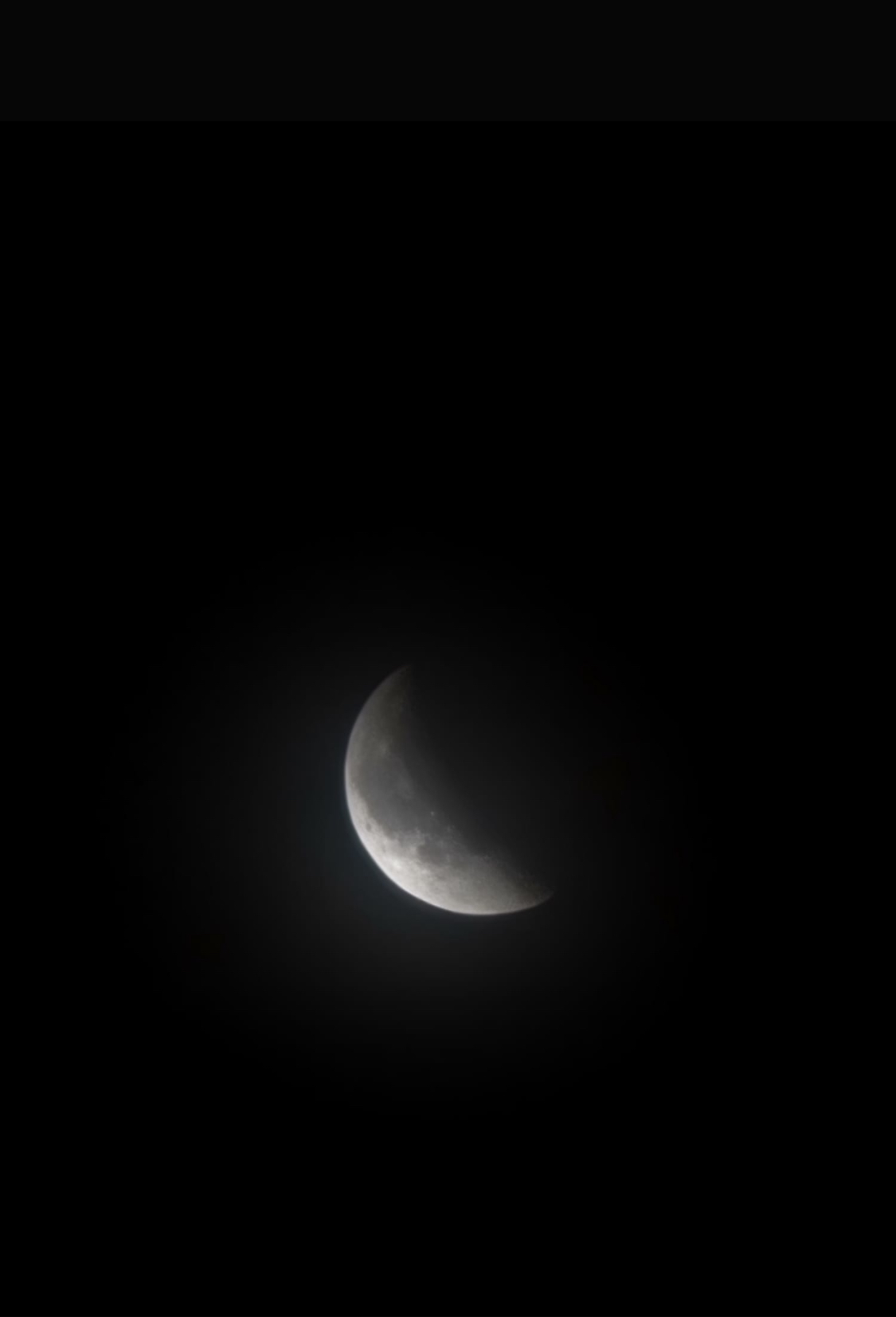 The Moon covered by the Earth's shadow cone.