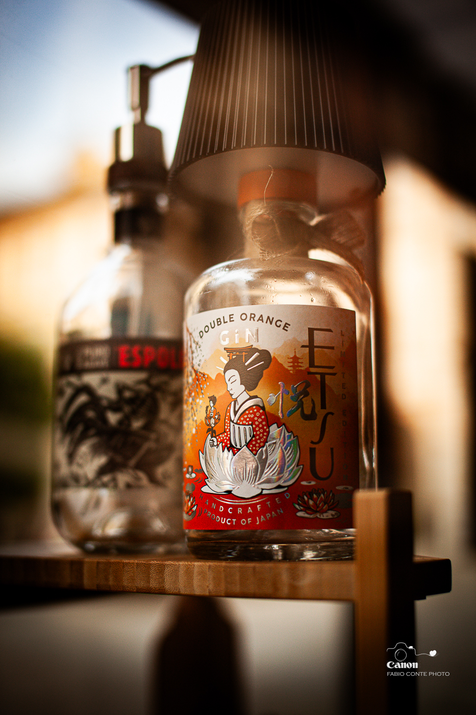 In front of a window, I really liked the bottle