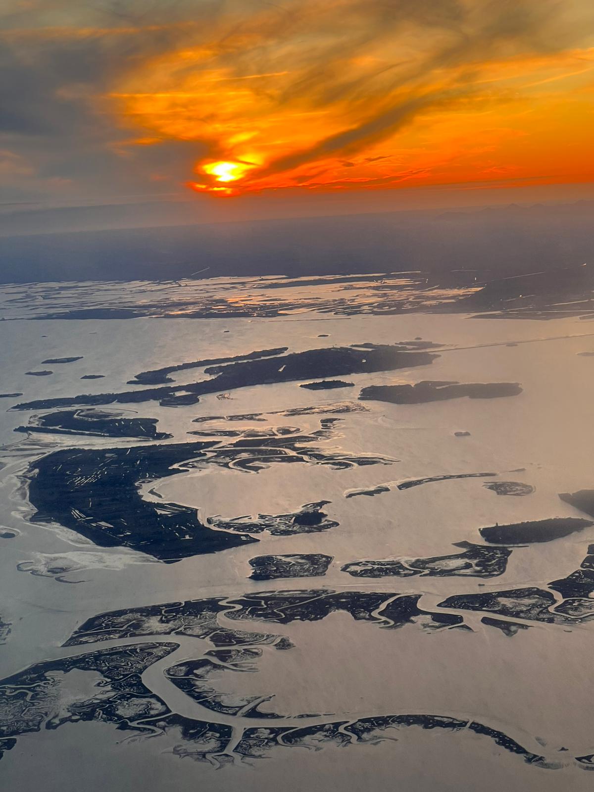 Venice lagoon aerial view at sunset