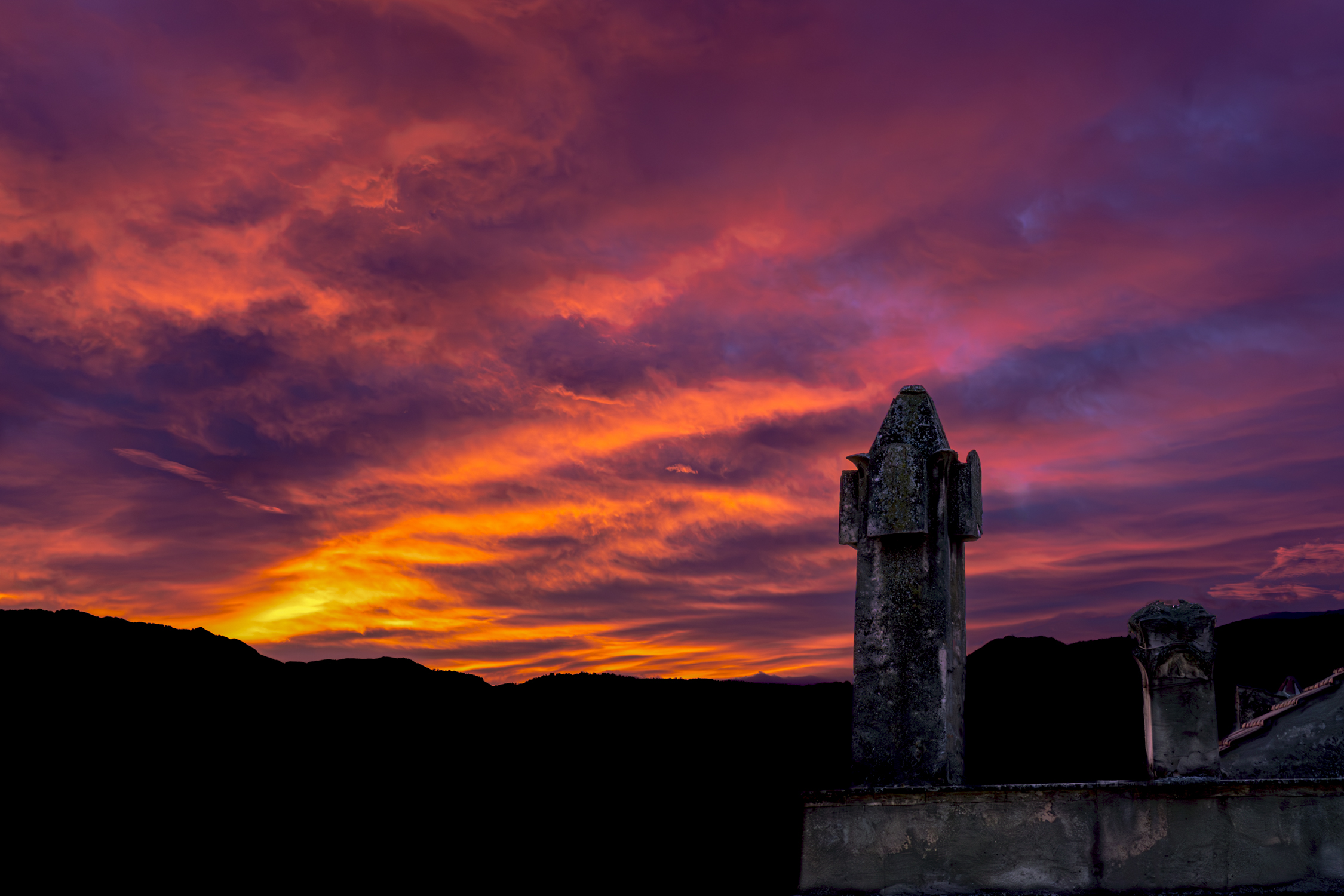 The almost white sun rises in the east, the light spreads.