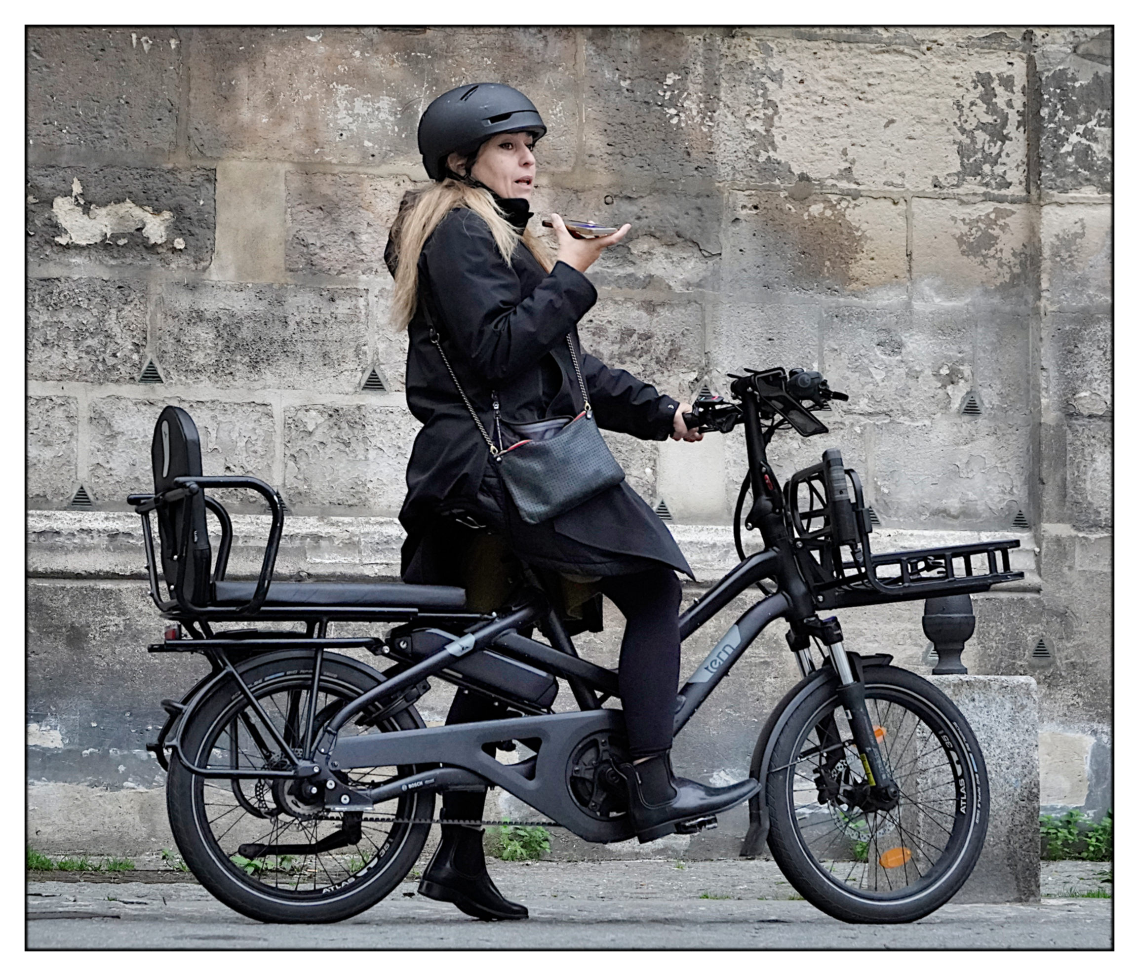 Foot on the ground and hands-free.