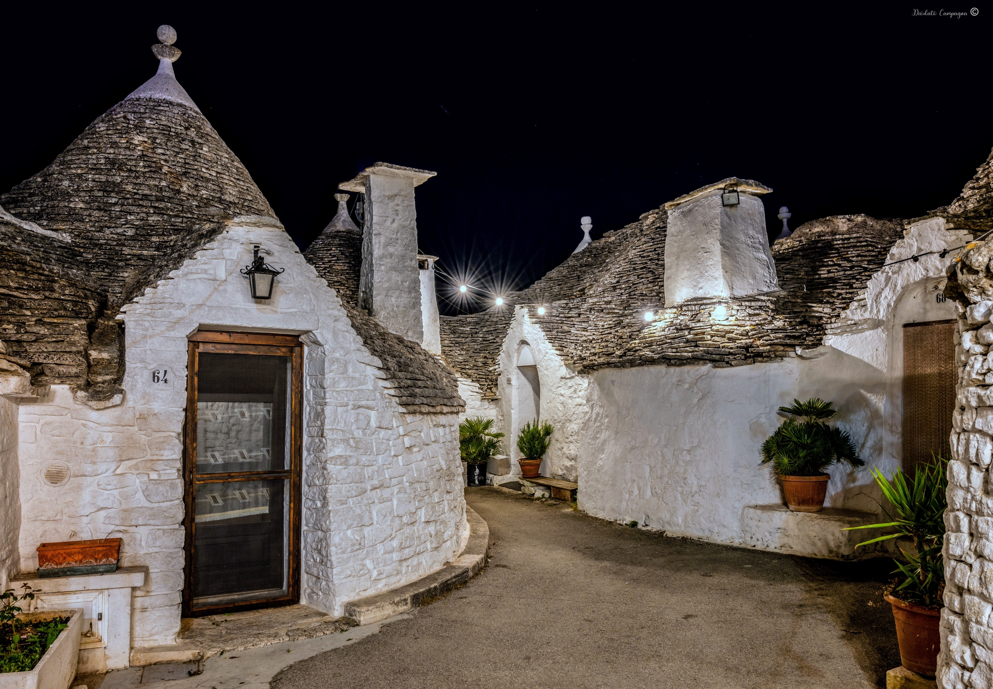 Among the trulli in the evening
