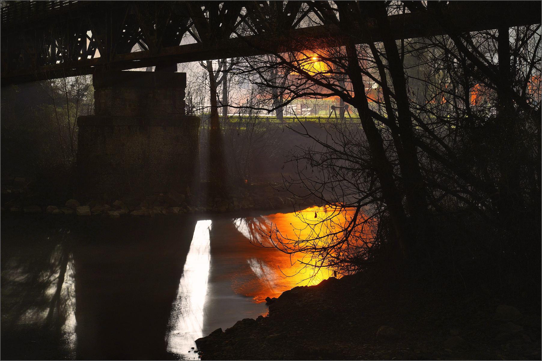 under the railway bridge over the Adda river