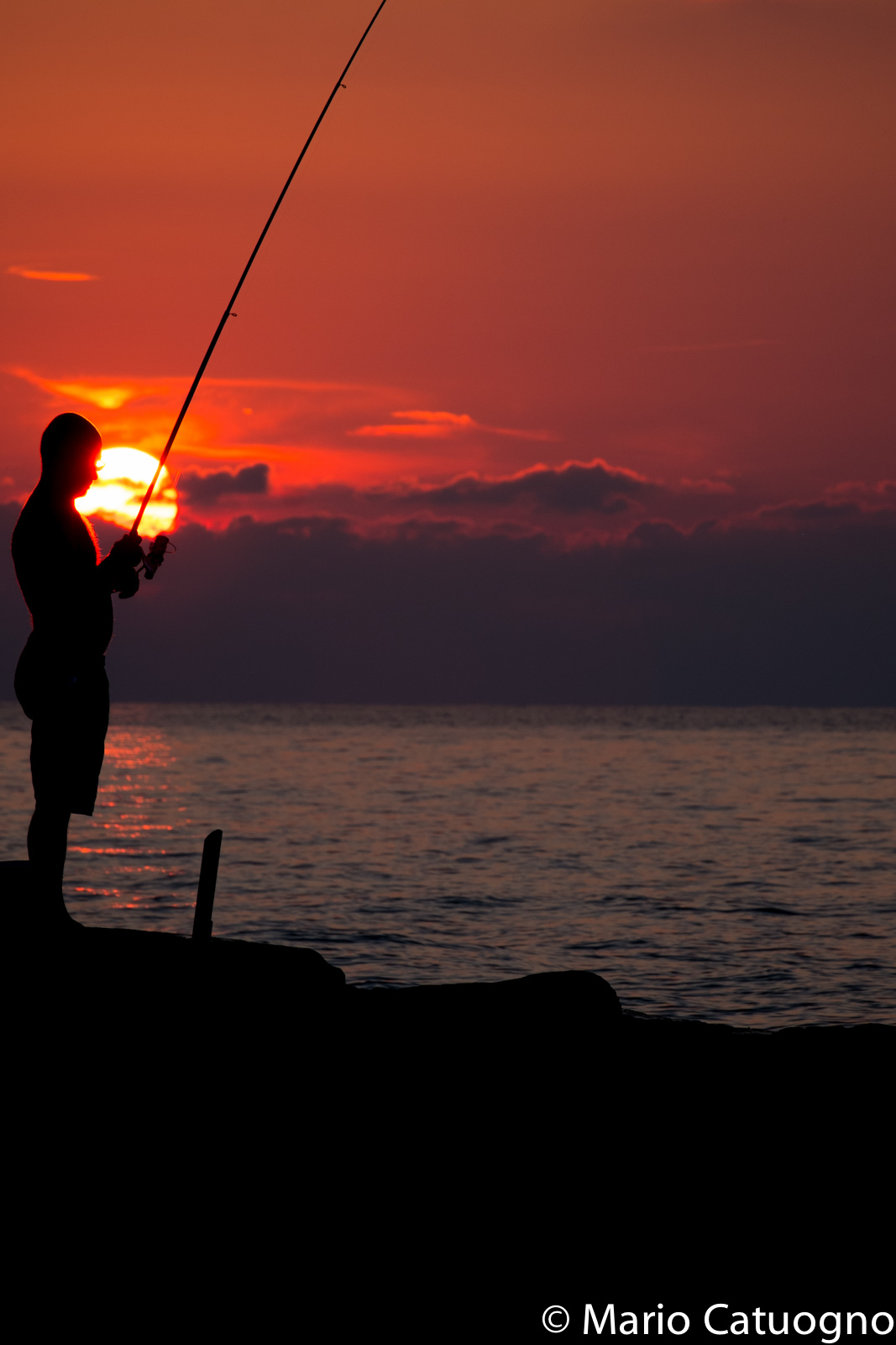 Fisherman at sunset