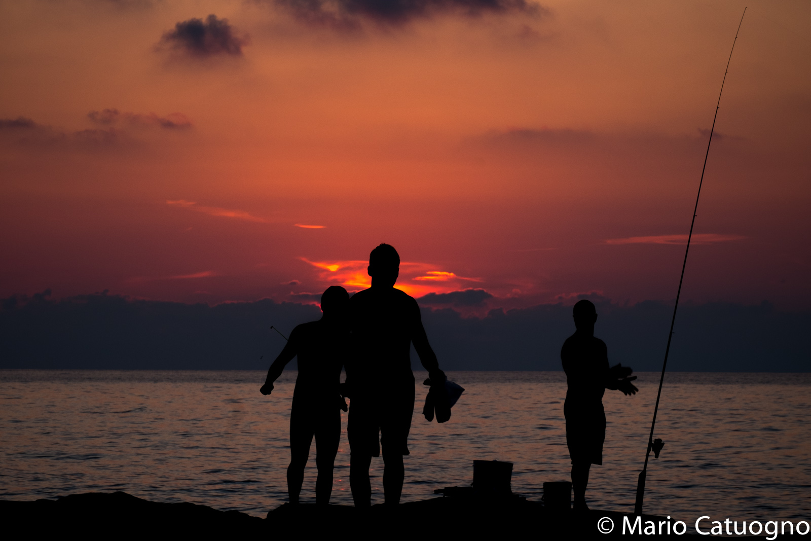 Fishermen at sunset