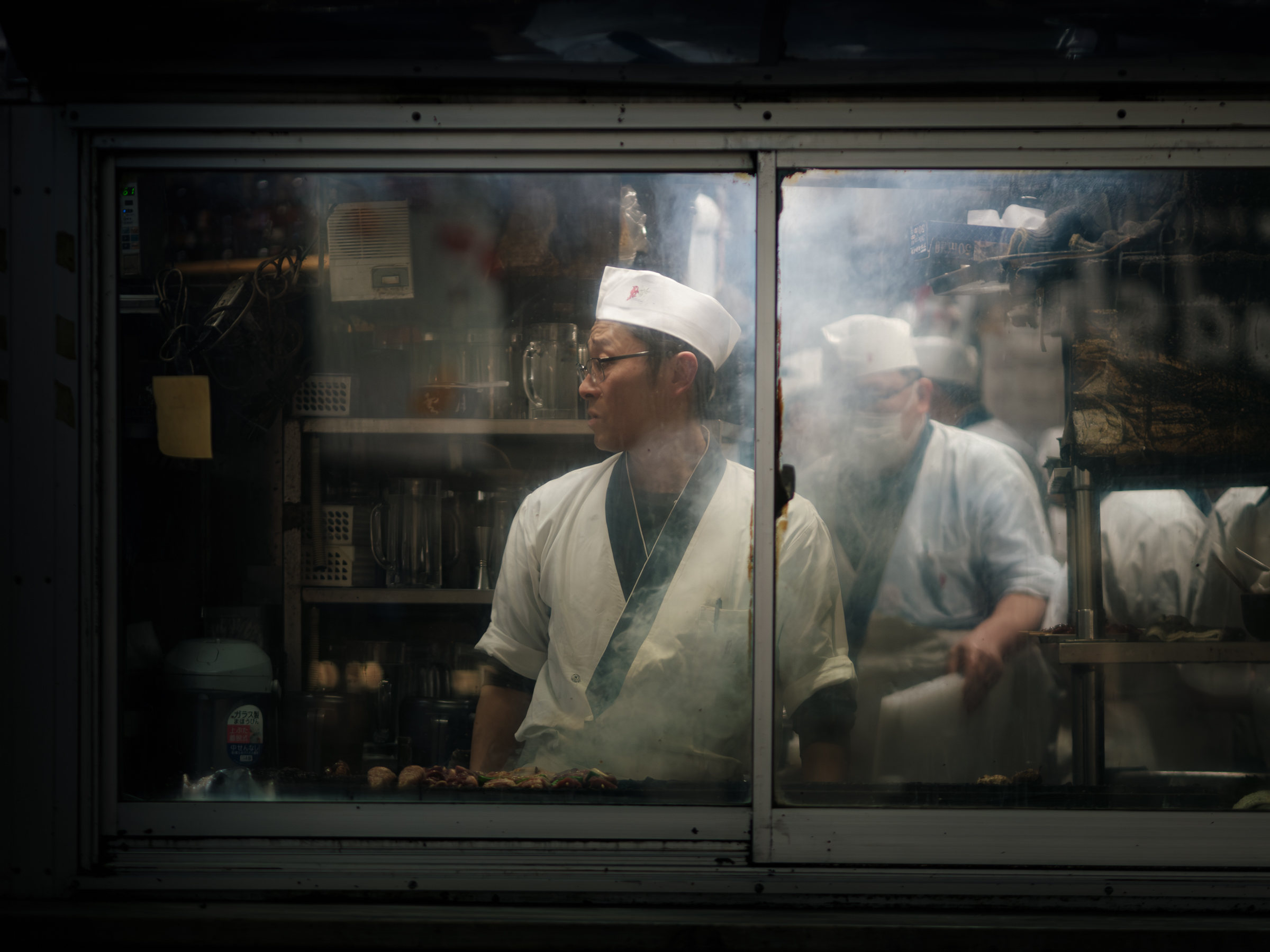Behind the glass I