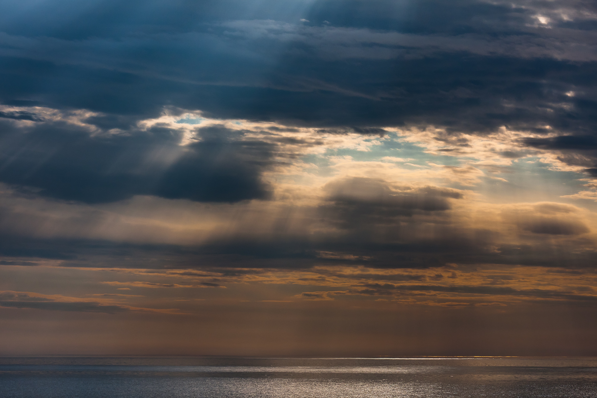 shafts of light on the ocean