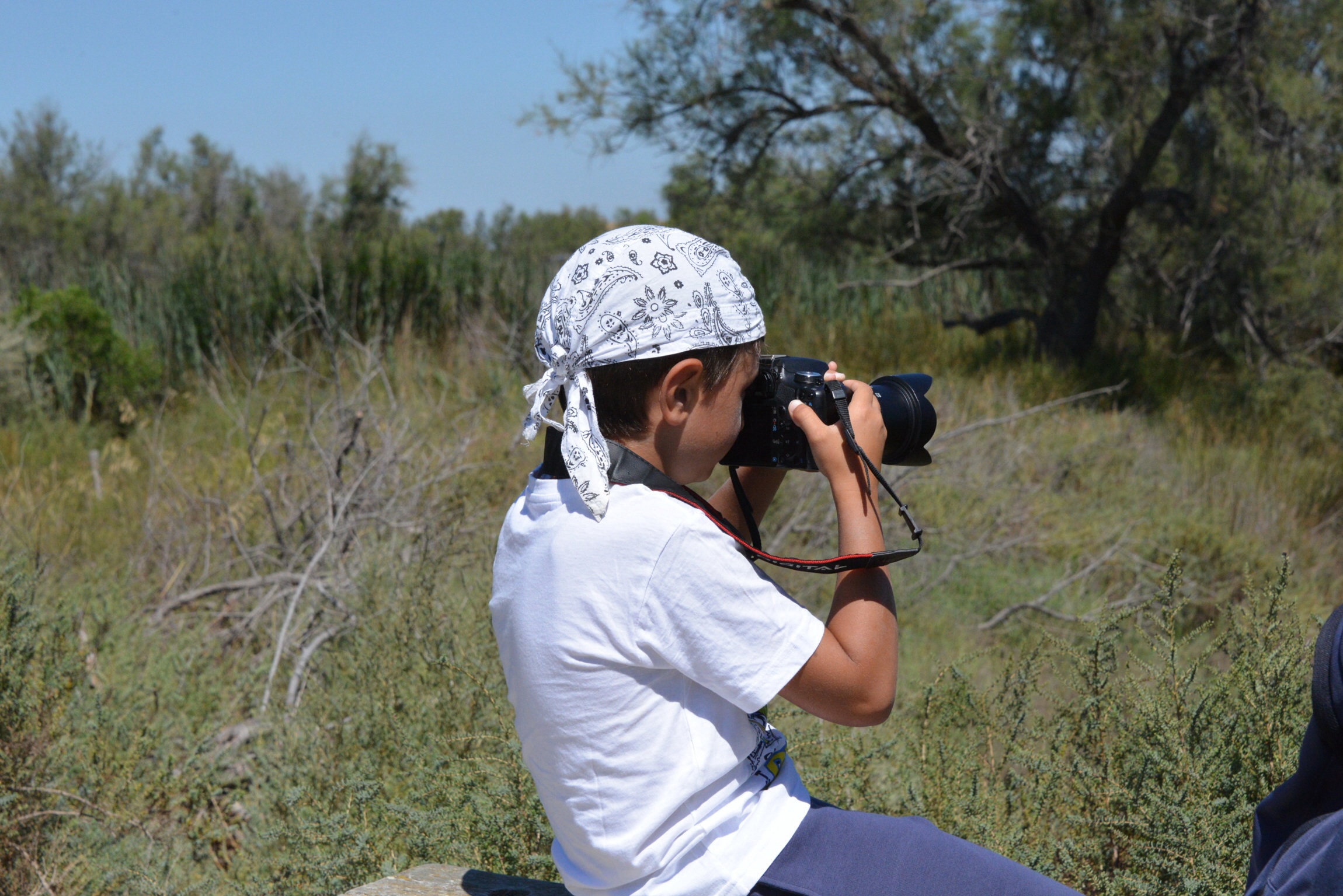 My son is 8 years old, with his Canon 500d and tamron 17-50