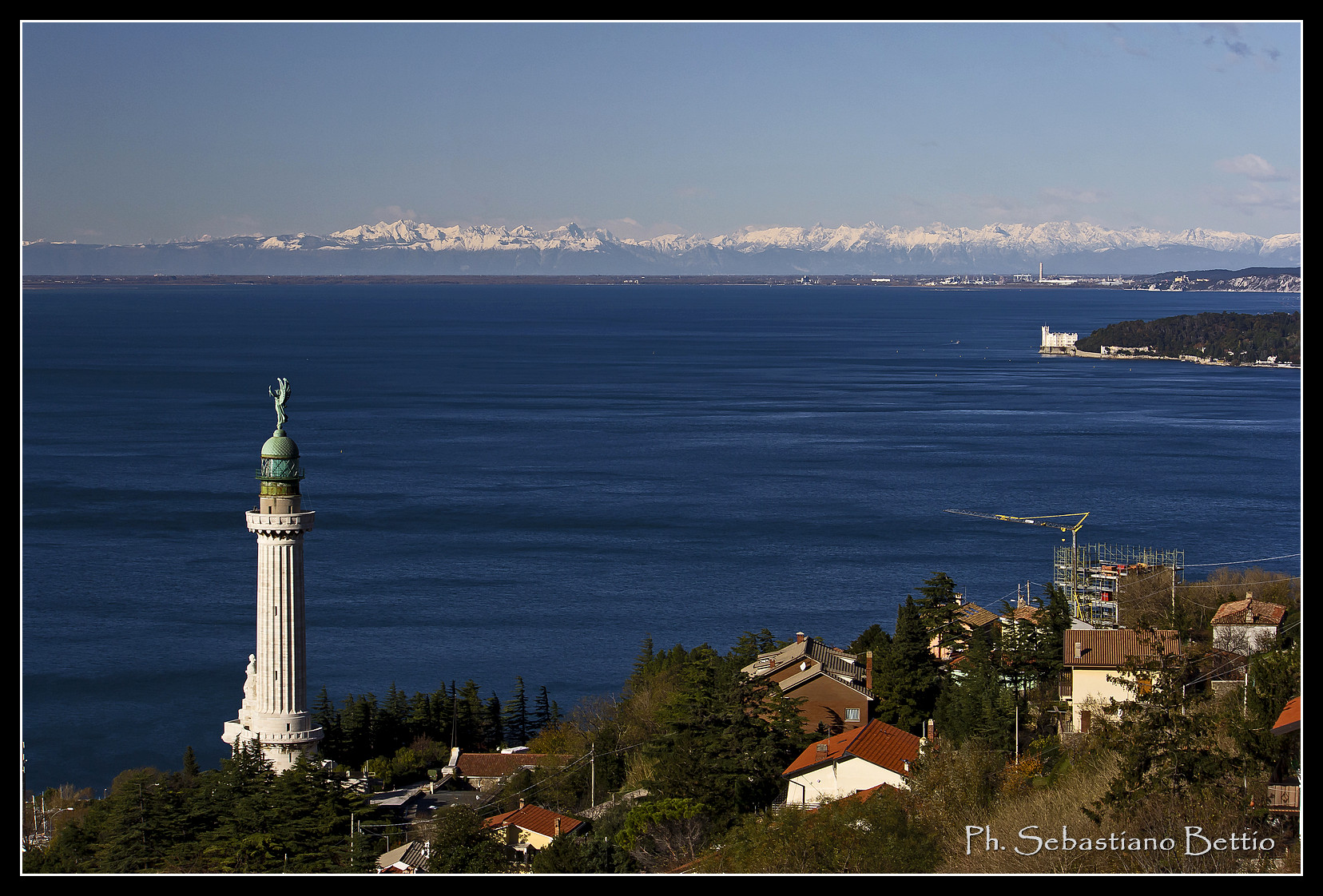Faro della Vittoria and the Miramare Castle