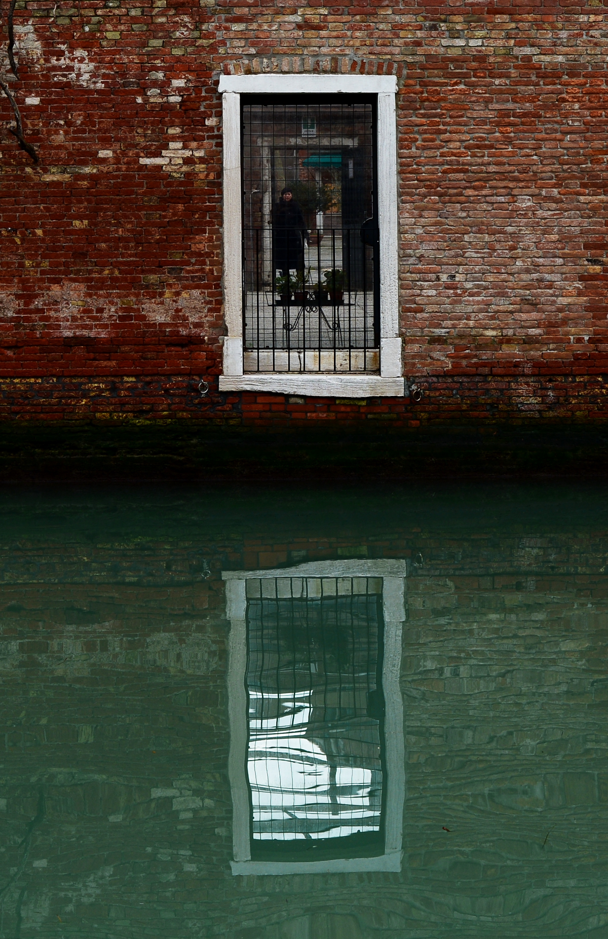 Reflection Venetian woman