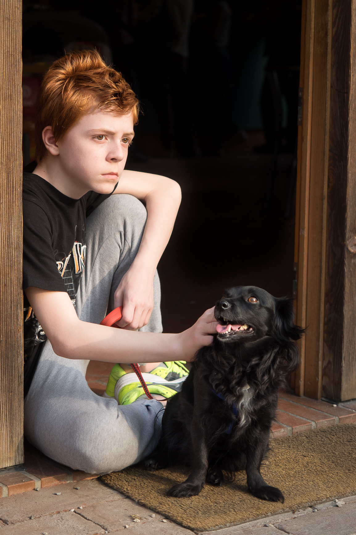 John and Syria in the doorway of the bar