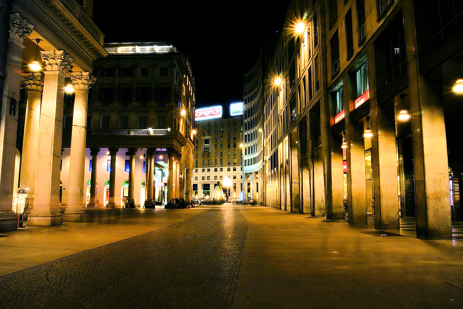 In the background, Piazza San Babila