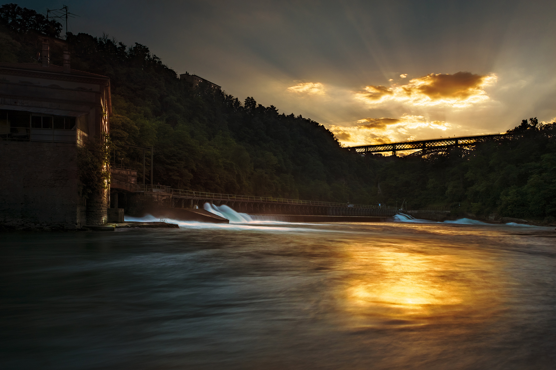 Paderno dam on sunset
