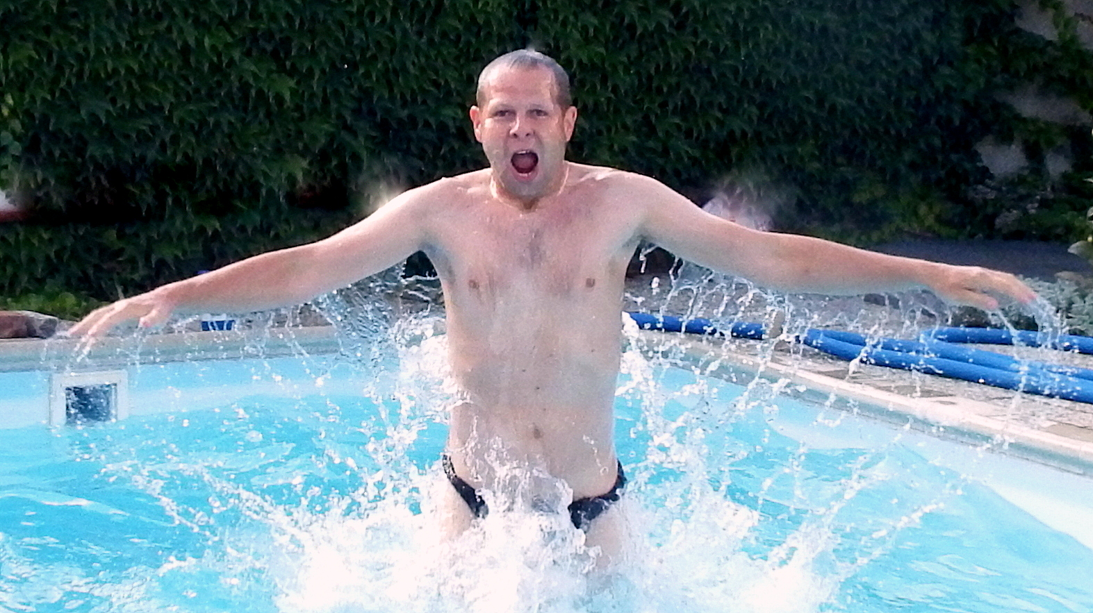 My son in law acting as shark in our family pool :-)