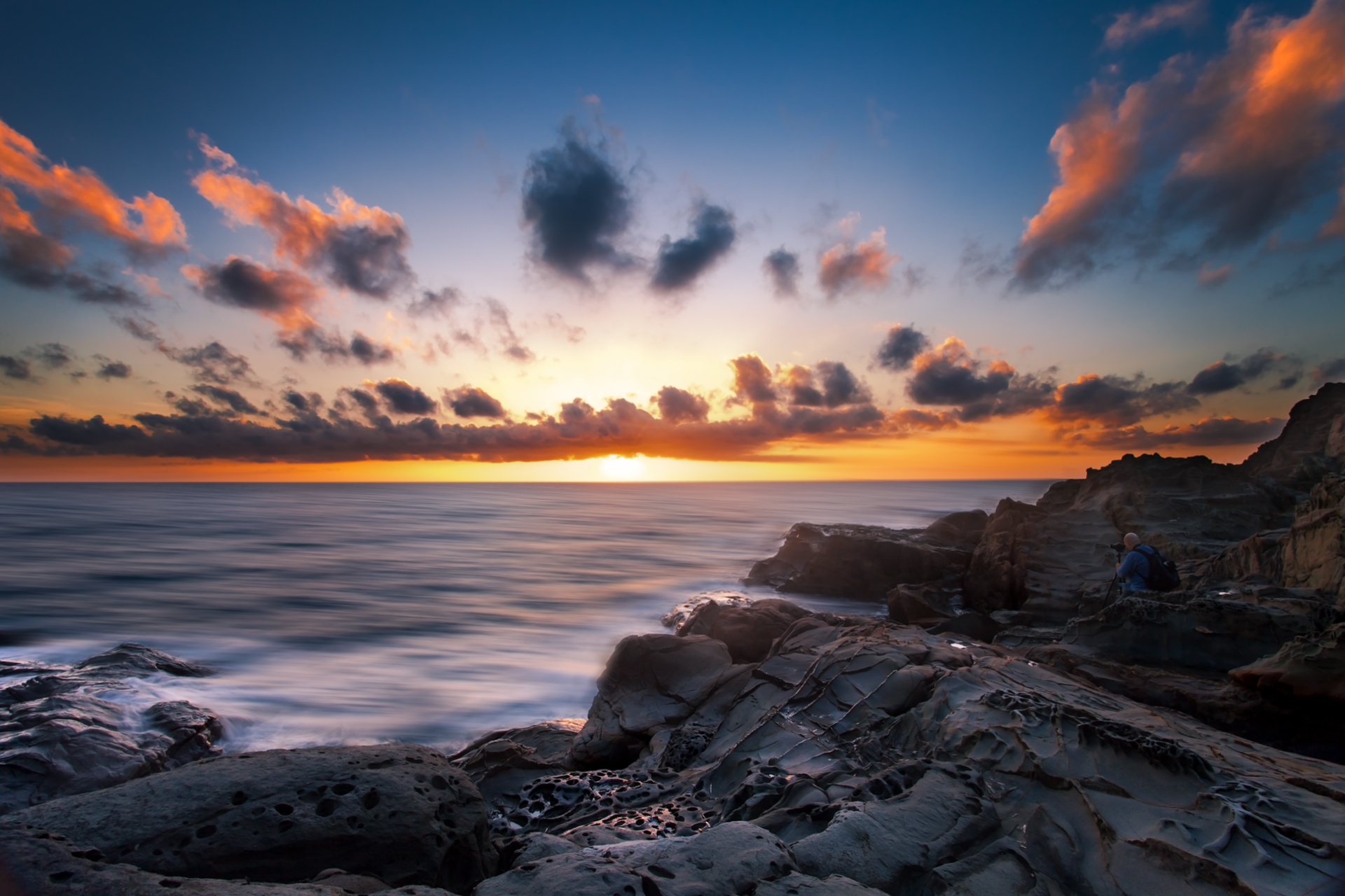 Photographer at sunset