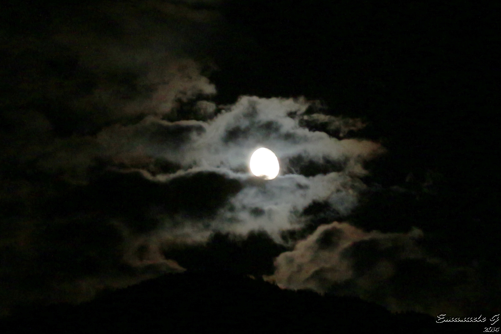 Moon between the clouds 2