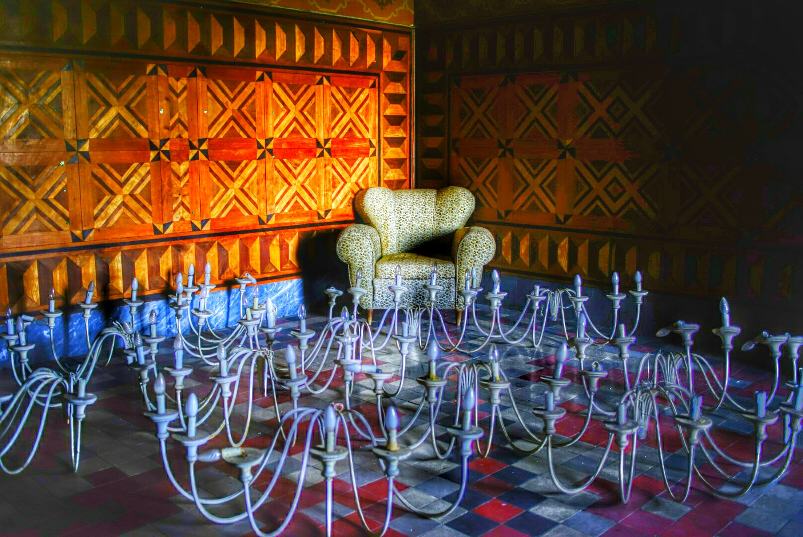 Armchair and chandelier